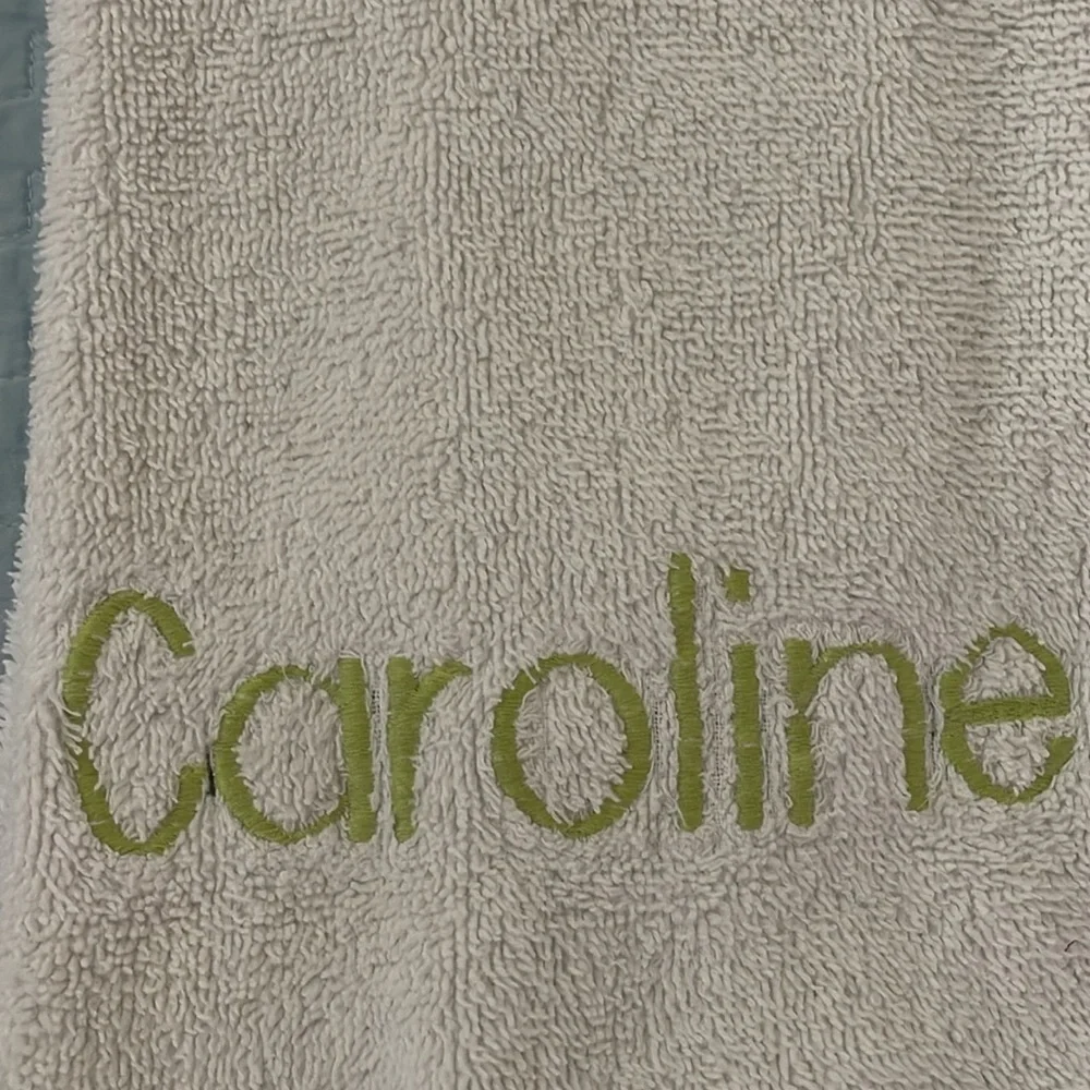 Two Raffia hand towels monogrammed with Caroline